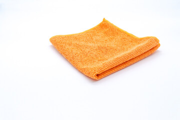 Fototapeta na wymiar orange kitchen rag on white background