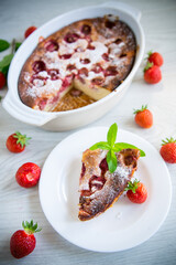 Sweet cottage cheese casserole with strawberry filling