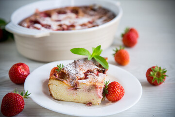 Sweet cottage cheese casserole with strawberry filling