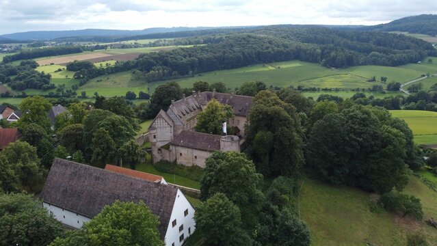Aerial view of buildings on the Desenberg hill in Daseburg, Germany