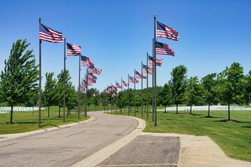 View of memorial park surrounded by American flags on flag poles