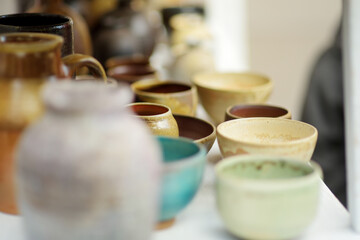 Ceramic dishes, tableware and jugs sold on Easter market in Vilnius.