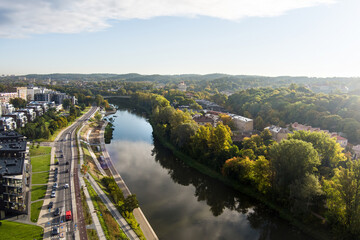 Beautiful aerial landscape of Neris river winding through Vilnius city.