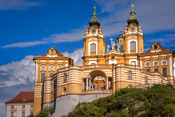 The majestic Abbey of Melk's baroque style building shot from below - obrazy, fototapety, plakaty