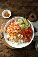 Healthy salmon poke with crunchy onion