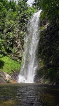Huge jungle waterfall in slow motion