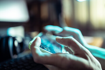 Obraz premium Playing game on mobile phone