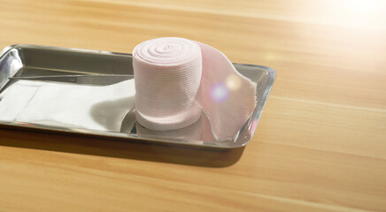 Bandage gauze on tray for dressing