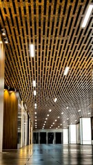 Vertical shot of a slatted metal ceiling with linear lighting