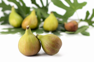 Fresh figs fruit isolated on white background. Concept of healthy food. Selective focus.