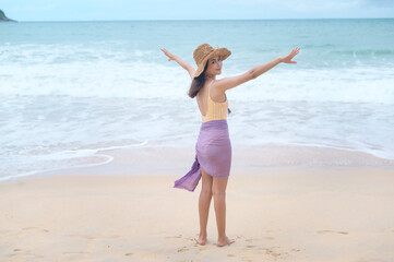 Young Beautiful woman in Bikini enjoying and relaxing on the beach,  Summer, vacation, holidays, Lifestyles concept.