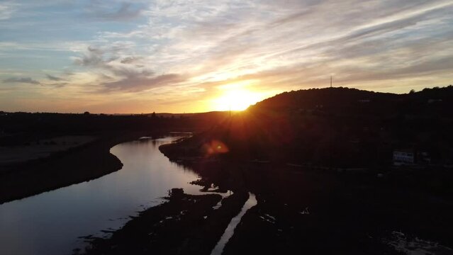 Stunning view over a peaceful river in Silves at sunrise, Algarve, Portugal