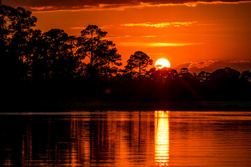 Fototapeta premium Sunset reflected in marshes near Charleston, SC.