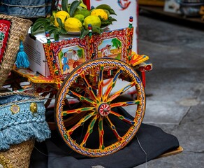 Close-up shot of a wheel cart in Sicilian theme and different colors