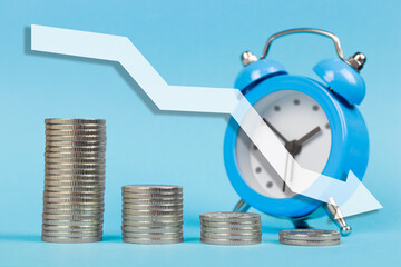 concept of loss, the collapse of the economy. stacked coins one on one in descending order on the...