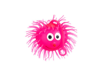 Rubber hedgehog toy isolated on a white background.
Toy for relieving stress. Luminous toy.