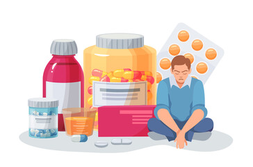 Depressed person sitting near big bottles with pills. Stressed man in despair having medical treatment