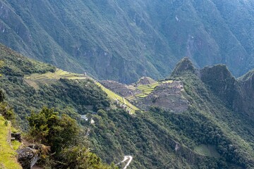 Hiking in the cloud forests and green valleys of the Inca Trail on the way to Machu Picchu in Peru