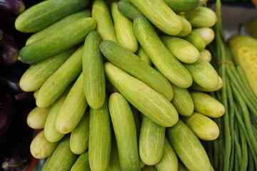 Fresh cucumbers in traditional market. Top view of cucumber