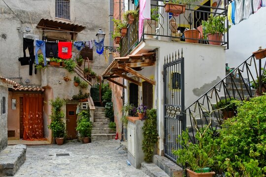 Beautiful shot of a narrow street between old houses in Scalea village, the Calabria region, Italy