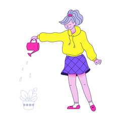 designer watering flowers in the office