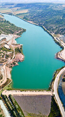 Aerial view of the dam lake between mountains 