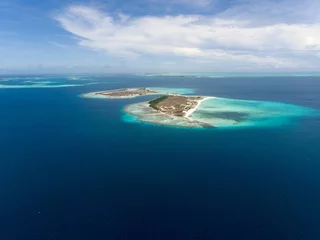 Foto op Canvas Aerial view of an island in Los Roques in Venezuela surrounded by clear seawater © Wirestock Creators