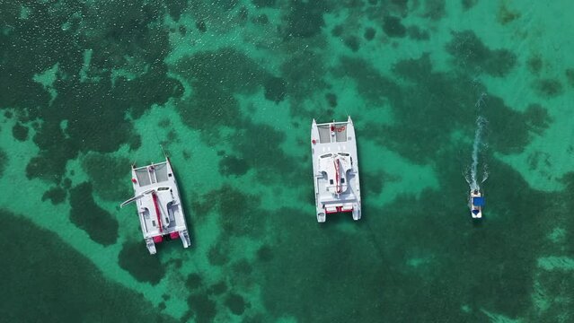 Aerial zenith shot of a boat in a beach. Aruba