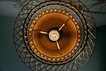 Closeup shot from the bottom of a round modern home chandelier