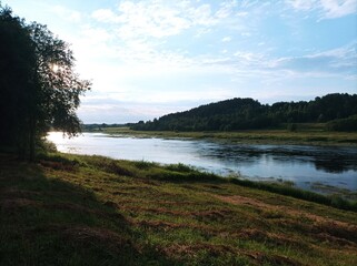 summer river in the countryside in the evening