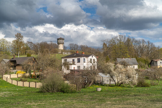 Talsi, Latvia - 6 May 2022: Talsi town, water tower and inscription with the name of the town in the spring.