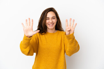 Young caucasian woman isolated on white background counting nine with fingers
