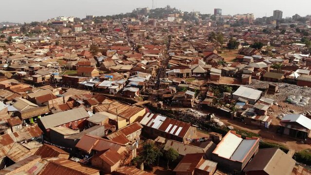 Drone shot over the slums of Uganda, poverty and poor one-storey buildings. Africa.