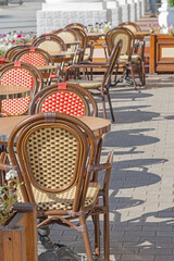 chairs and tables in the summer cafe