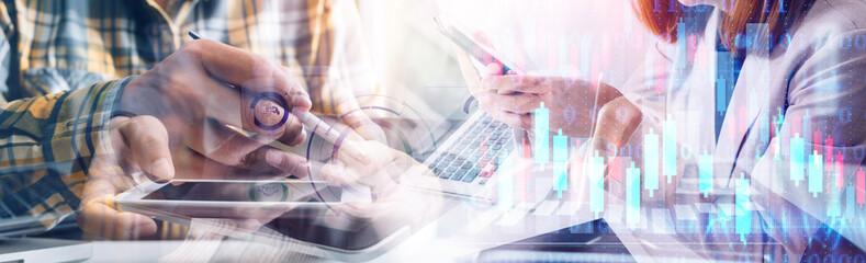 Business accountant working on desk using mobile phone and calculator to calculate budget concept finance and accounting in morning light
