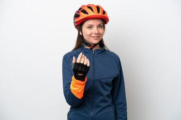 Young cyclist Lithuanian woman isolated on white background inviting to come with hand. Happy that you came
