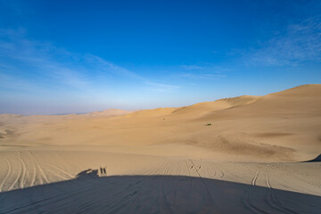 Fototapeta na wymiar Huacachina is a desert oasis and a small village just west of the city of Ica in southwestern Peru
