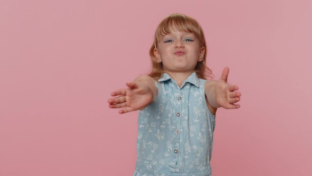 Funny amusing preteen child girl kid making playful silly facial expressions grimacing, fooling around, parodies seal animal clapping hands. Little toddler children stupid brainless dumb expression