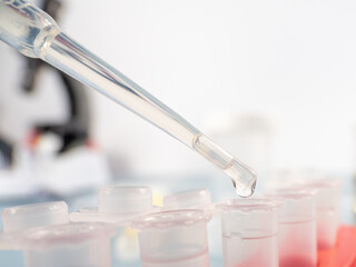 Analytical chemistry - a sample is pipetted into a test tube.