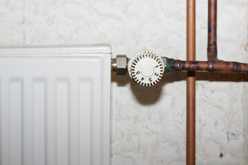 radiators with thermostat and old copper pipes, a heating system