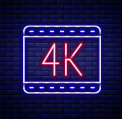 Glowing neon line 4k movie, tape, frame icon isolated on brick wall background. Colorful outline concept. Vector