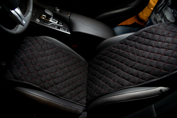 New interior of an expensive car with capes and covers
