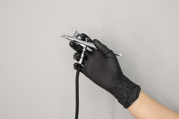 Airbrush. Tool for airbrushing nails. A device that sprays paint