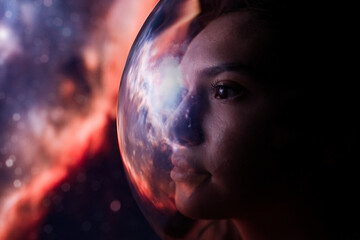 Concept: space expedition. Portrait Female astronaut in space on planet orbit                            © D'Action Images