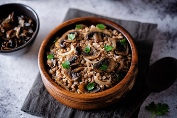 Buckwheat porridge with roasted mushrooms in a bowl