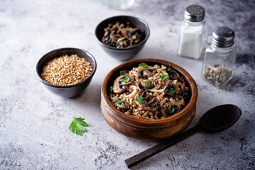 Buckwheat porridge with roasted mushrooms in a bowl