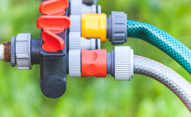plastic multi-channel supply water fitting for garden hoses