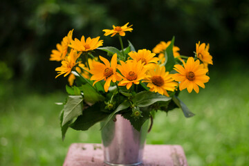 yellow flowers in a vase