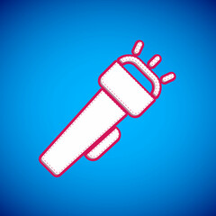 White Flashlight icon isolated on blue background. Vector