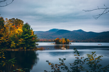 Beautiful fall colors in Vermont. River, mountains and trees. Landscape photography